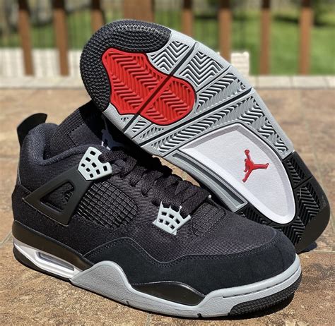 jordan 4 black canvas shoes.